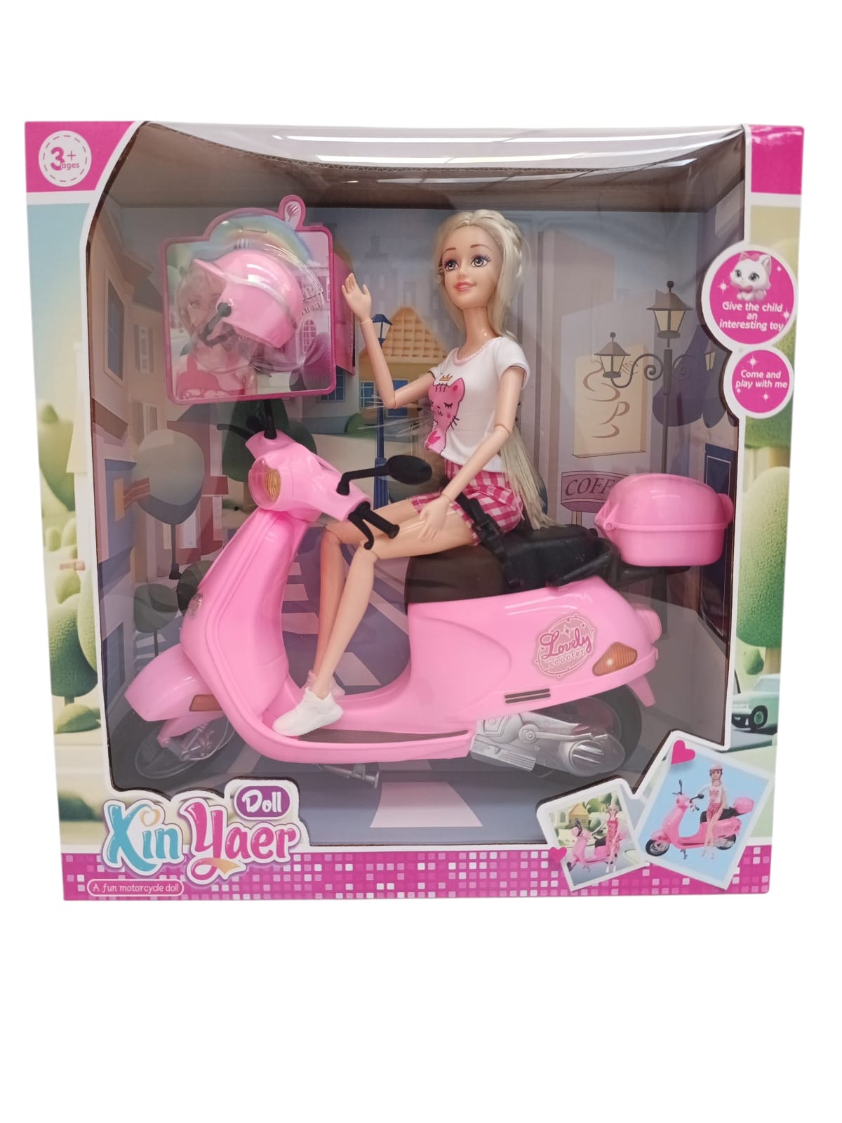 Muñeca con moto y accesorios
